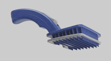 Blue pet grooming brush on a white background