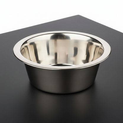 Stainless steel bowl on a black surface